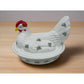Covered Chicken Dish with on Woven Nest