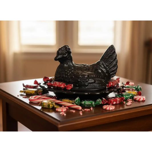 black glass covered chicken on nest candy dish