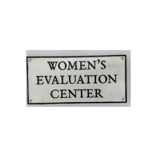 Cast Iron Sign "Women's Evaluation Center"
